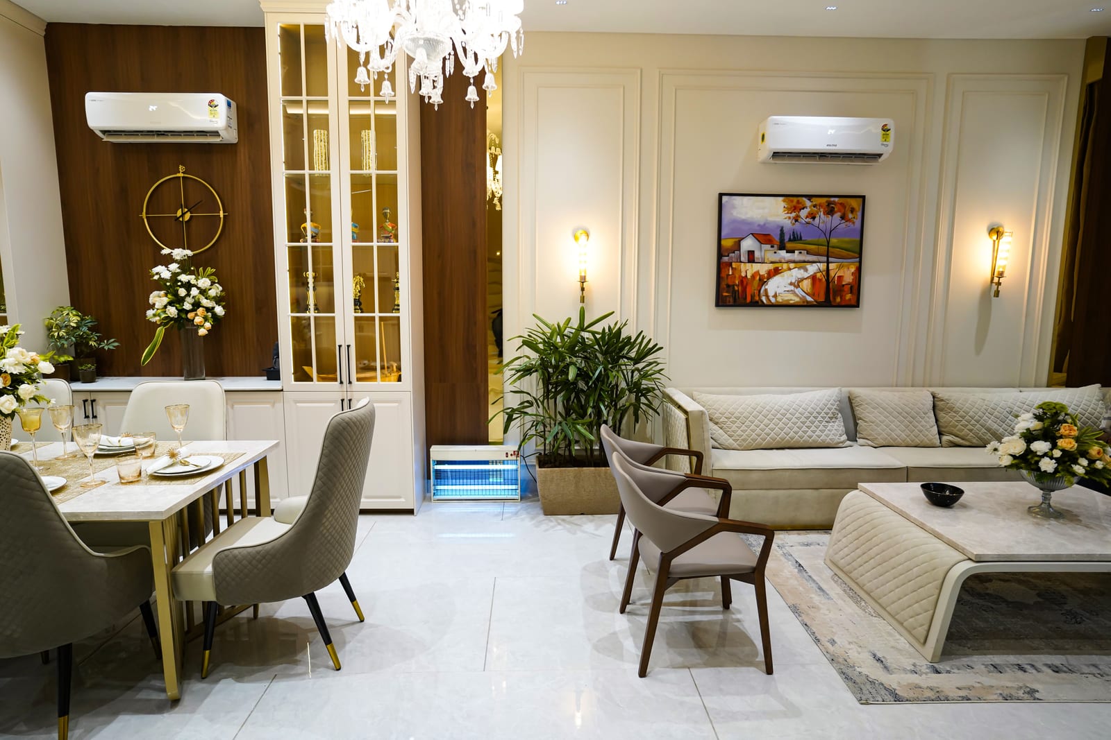 Photo of the furnished living and dining area in the Highland Luxuria sample villa, Zirakpur